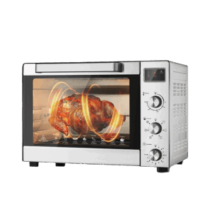 A silver electric toaster oven roasting a whole chicken on a rotisserie. It features a transparent glass door, multiple control knobs on the right for temperature, function, and time settings, and is designed for home cooking to make various roasted dishes.